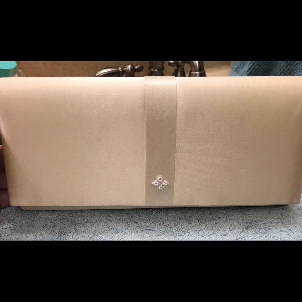 Dillard’s silk cream handbag. Great shape.